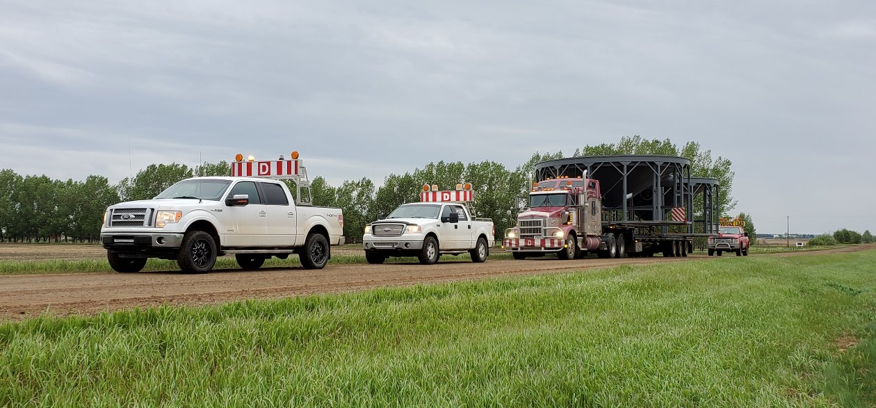 Pilot truck and escort vehicle services by Terrock Trucking and Excavating in Taber, Alberta